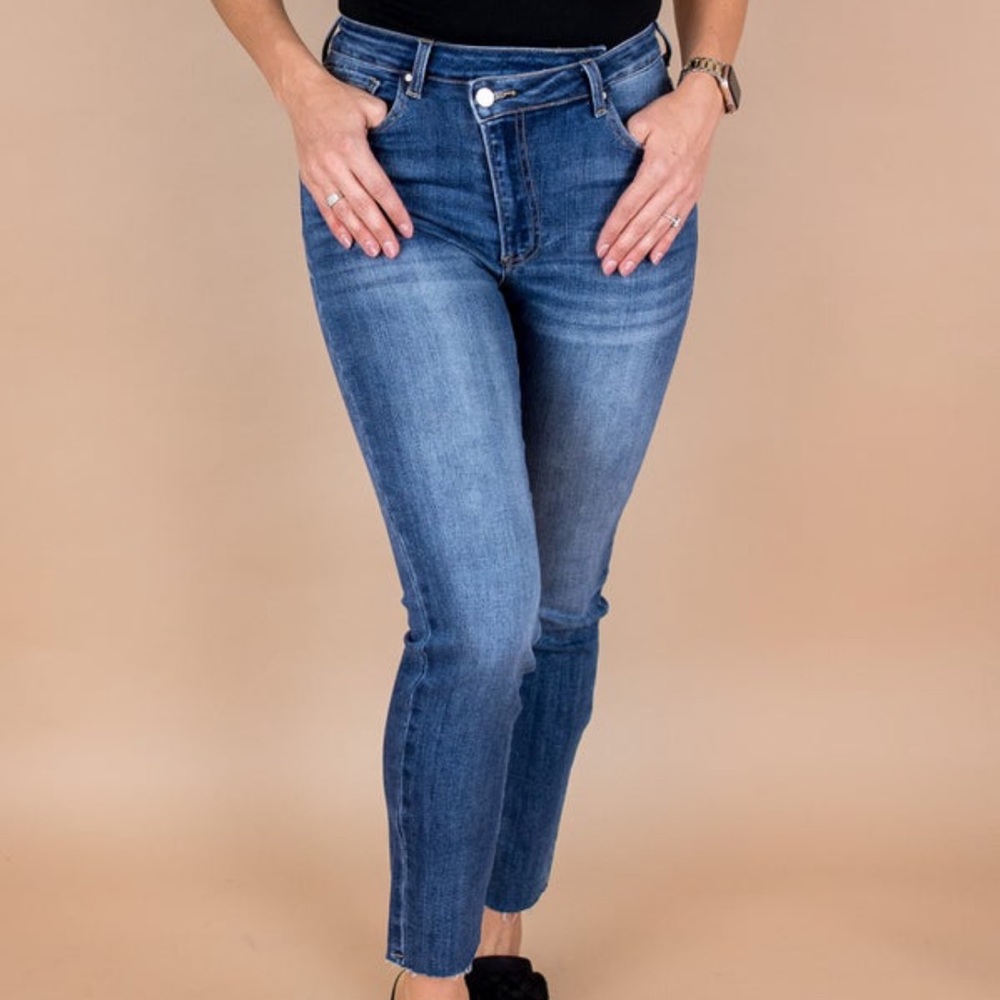 Side button skinny denim by Risen.